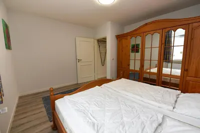 Ein Bett oder Betten in einem Zimmer der Unterkunft Haus 