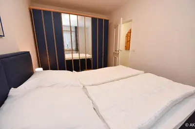 Ein Bett oder Betten in einem Zimmer der Unterkunft Haus 
