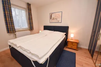 Ein Bett oder Betten in einem Zimmer der Unterkunft Haus 