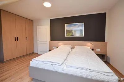 Ein Bett oder Betten in einem Zimmer der Unterkunft Haus 