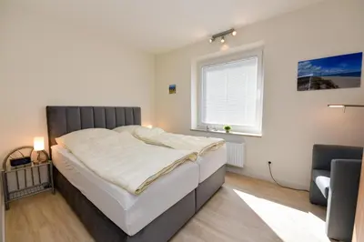 Ein Bett oder Betten in einem Zimmer der Unterkunft Haus 