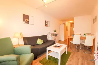 Ein Sitzbereich in der Unterkunft Haus Elbe Döse Wohnung 2