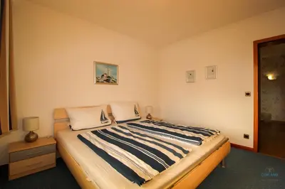 Ein Bett oder Betten in einem Zimmer der Unterkunft Haus Elbe Döse Wohnung 12a