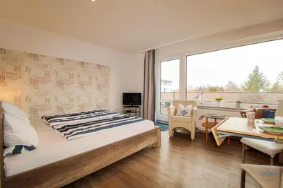 Ein Bett oder Betten in einem Zimmer der Unterkunft Haus Elbe Döse Wohnung 16