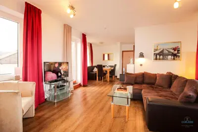 Ein Sitzbereich in der Unterkunft Haus Elbe Döse Wohnung 17