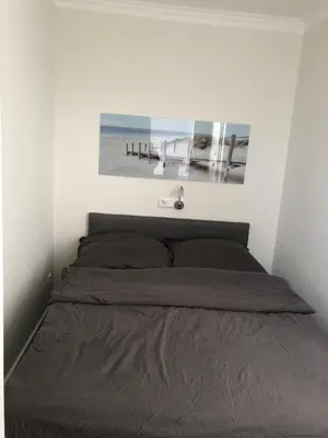 Ein Bett oder Betten in einem Zimmer der Unterkunft Haus Elisabeth Fewo 5B