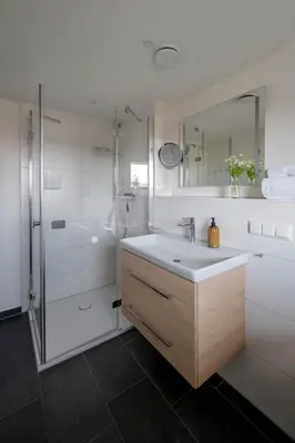Ein Badezimmer in der Unterkunft Haus Lütt Schick Apartment Beeke