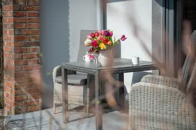 Ein Sitzbereich in der Unterkunft Haus Lütt Schick Apartment Beeke
