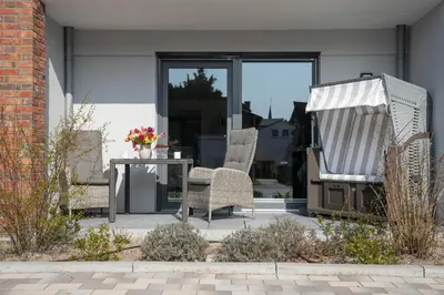 Ein Sitzbereich in der Unterkunft Haus Lütt Schick Apartment Beeke