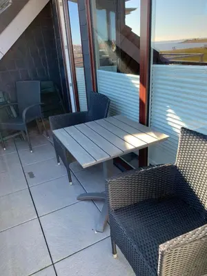 Ein Sitzbereich in der Unterkunft Rosengarten 307