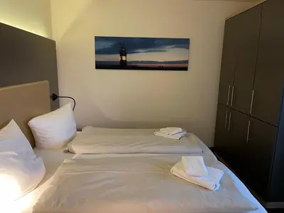 Ein Bett oder Betten in einem Zimmer der Unterkunft Resort Deichgraf Resort Deichgraf 27-12