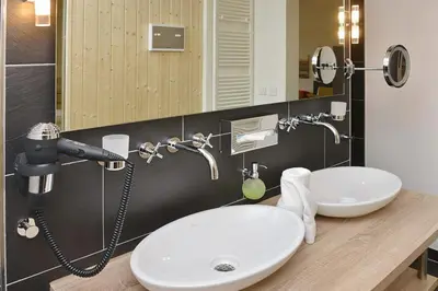 Ein Badezimmer in der Unterkunft Resort Deichgraf Resort Deichgraf 27-03