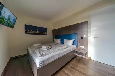 Ein Bett oder Betten in einem Zimmer der Unterkunft Resort Deichgraf Resort Deichgraf 27-08