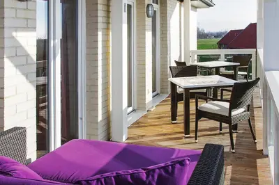 Ein Balkon oder eine Terrasse in der Unterkunft Resort Deichgraf Resort Deichgraf 27-08