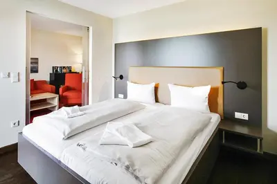 Ein Bett oder Betten in einem Zimmer der Unterkunft Resort Deichgraf Resort Deichgraf 27-15