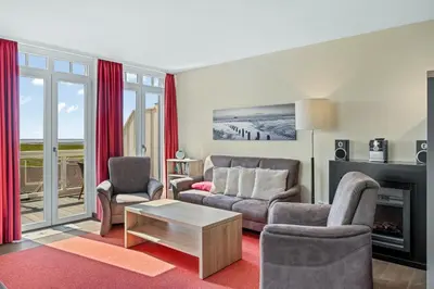 Ein Sitzbereich in der Unterkunft Resort Deichgraf Resort Deichgraf 27-18
