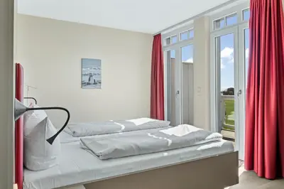 Ein Bett oder Betten in einem Zimmer der Unterkunft Resort Deichgraf Resort Deichgraf 27-19