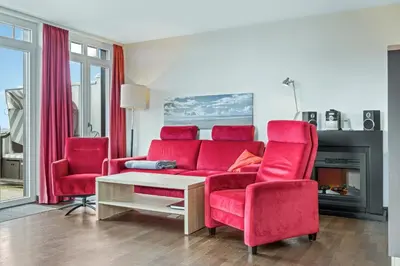 Ein Sitzbereich in der Unterkunft Resort Deichgraf Resort Deichgraf 27-20