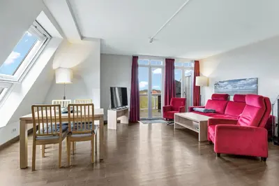 Ein Sitzbereich in der Unterkunft Resort Deichgraf Resort Deichgraf 27-20