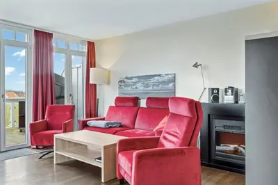 Ein Sitzbereich in der Unterkunft Resort Deichgraf Resort Deichgraf 27-20