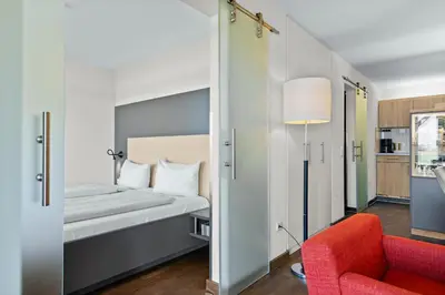 Ein Bett oder Betten in einem Zimmer der Unterkunft Resort Deichgraf Resort Deichgraf 31-03