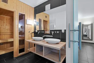 Ein Badezimmer in der Unterkunft Resort Deichgraf Resort Deichgraf 31-06