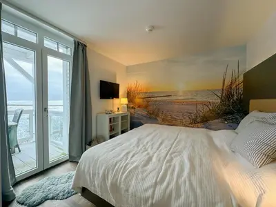 Ein Bett oder Betten in einem Zimmer der Unterkunft Resort Deichgraf Resort Deichgraf 31-10
