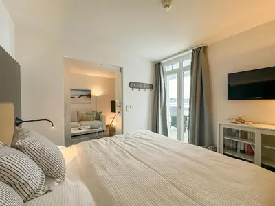 Ein Bett oder Betten in einem Zimmer der Unterkunft Resort Deichgraf Resort Deichgraf 31-10