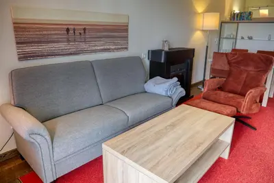 Ein Sitzbereich in der Unterkunft Resort Deichgraf Resort Deichgraf 31-12