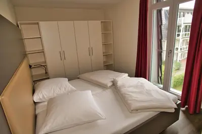 Ein Bett oder Betten in einem Zimmer der Unterkunft Resort Deichgraf Resort Deichgraf 31-12