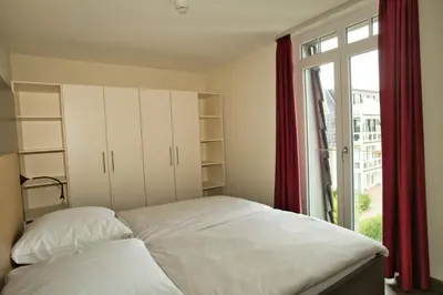 Ein Bett oder Betten in einem Zimmer der Unterkunft Resort Deichgraf Resort Deichgraf 31-12
