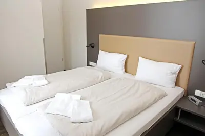 Ein Bett oder Betten in einem Zimmer der Unterkunft Resort Deichgraf Resort Deichgraf 31-15