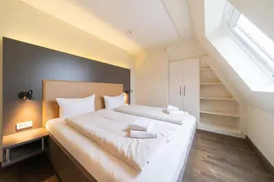 Ein Bett oder Betten in einem Zimmer der Unterkunft Resort Deichgraf Resort Deichgraf 31-20