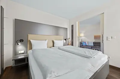 Ein Bett oder Betten in einem Zimmer der Unterkunft Resort Deichgraf Resort Deichgraf 31-07