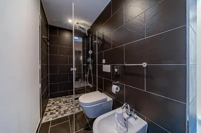 Ein Badezimmer in der Unterkunft Resort Deichgraf Resort Deichgraf 27-05