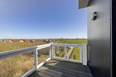 Ein Balkon oder eine Terrasse in der Unterkunft Resort Deichgraf Resort Deichgraf 27-21