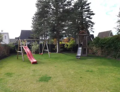 Ein Kinderspielbereich in der Unterkunft Ferienhaus Niemann