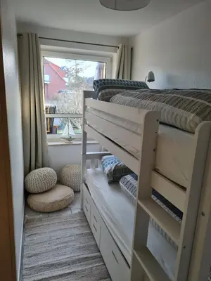 Ein Bett oder Betten in einem Zimmer der Unterkunft Watt will man Meer