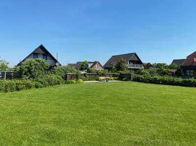 Ein Garten an der Unterkunft Heimathafen Friedrichskoog