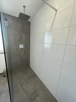 Ein Badezimmer in der Unterkunft Lee-Moderne Neubauwohnung in Strandnähe - Wallbox