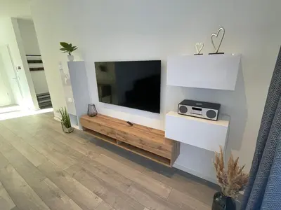 Küche/Küchenzeile in der Unterkunft Lee-Moderne Neubauwohnung in Strandnähe - Wallbox