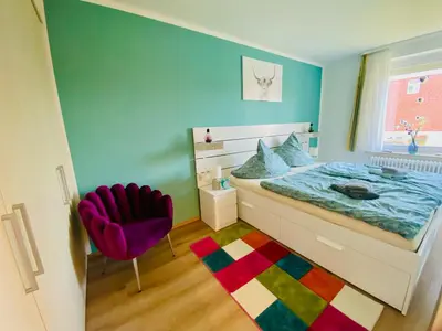 Ein Bett oder Betten in einem Zimmer der Unterkunft Strandnixe Cuxhaven