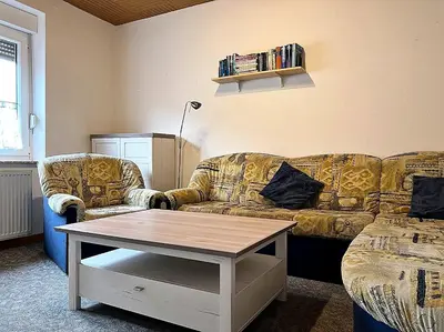 Ein Sitzbereich in der Unterkunft Haus Waldluft Whg. Birke