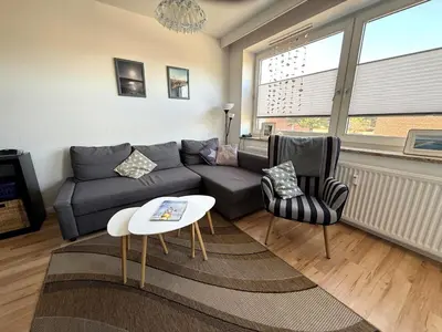 Ein Sitzbereich in der Unterkunft Haus Medemsand, Whg 214