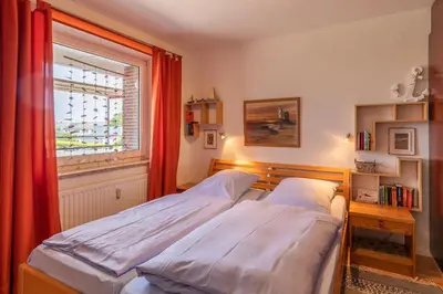 Ein Bett oder Betten in einem Zimmer der Unterkunft Haus Medemsand, Whg 214