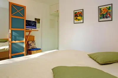 Ein Bett oder Betten in einem Zimmer der Unterkunft Haus Weisse Möwe, Whg 1