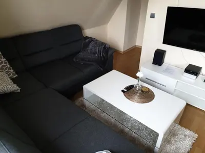 Ein Sitzbereich in der Unterkunft Strandstraße 51a, FeWo Piratennest