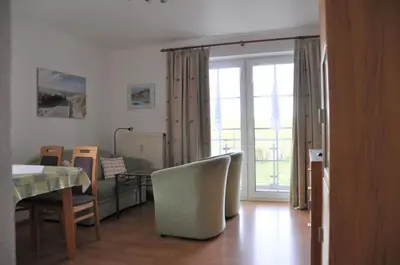 Ein Sitzbereich in der Unterkunft Nordseedüne, Ferienwohnung 3