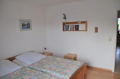Ein Bett oder Betten in einem Zimmer der Unterkunft Nordseedüne, Ferienwohnung 3
