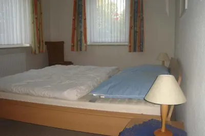 Ein Bett oder Betten in einem Zimmer der Unterkunft Am grooten Steen 20, Ferienwohnung 1